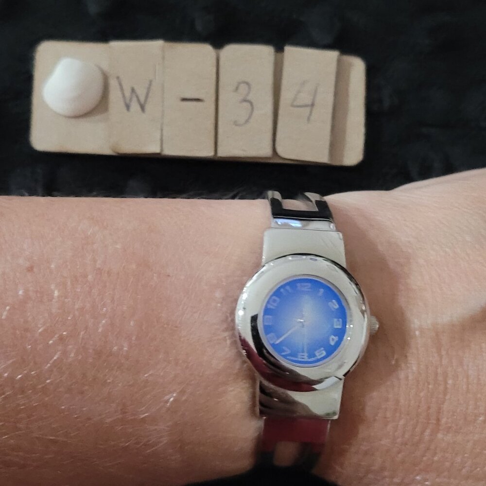 Item #W34  Ladies Watch Cuff style Blue Face  PL331S